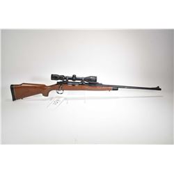 Non-Restricted rifle Remington model 700, .338 Win mag bolt action, w/ bbl length 24" [Blued barrel 