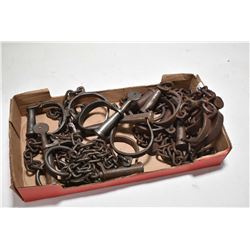 Six sets of vintage handcuffs and shackles