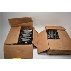 Two boxes of twelve no. 2 Oneida Victor coil spring traps