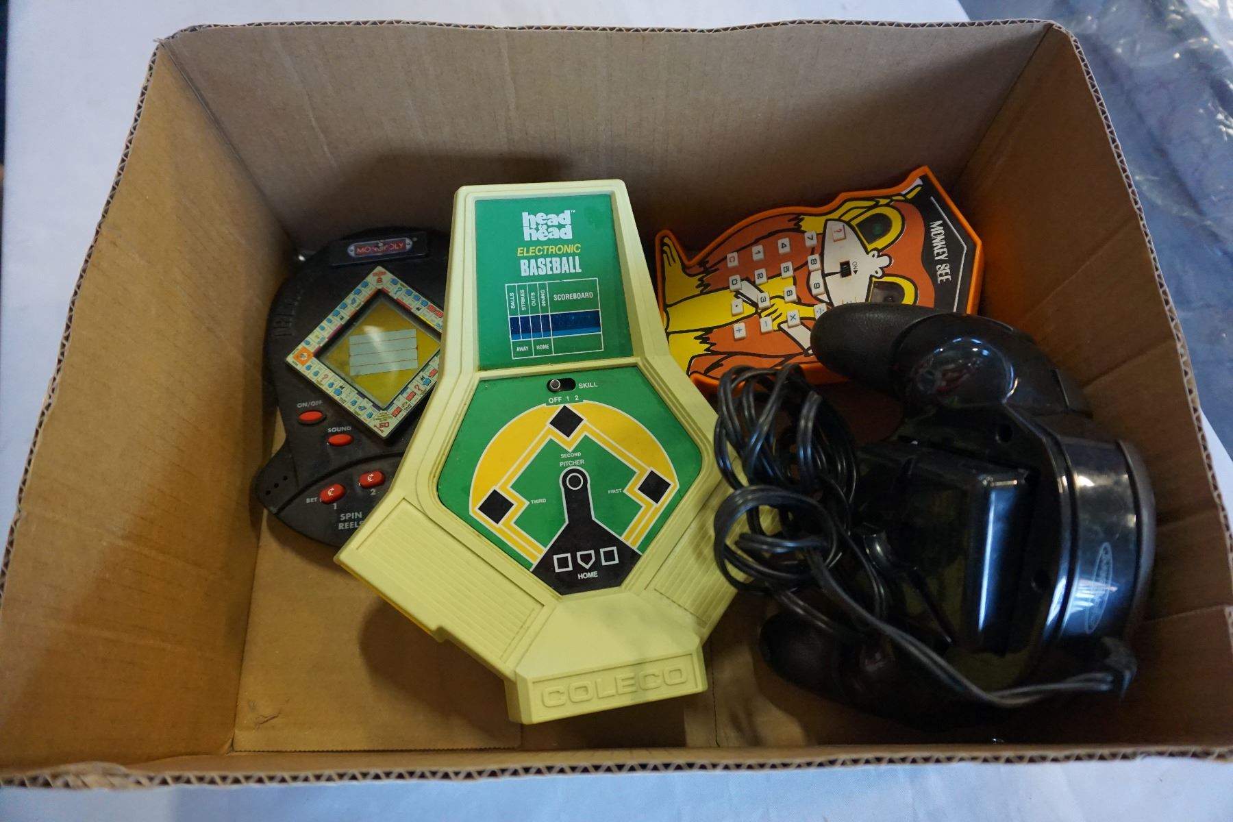BOX OF VINTAGE ELECTRONICS GAMES Big Valley Auction