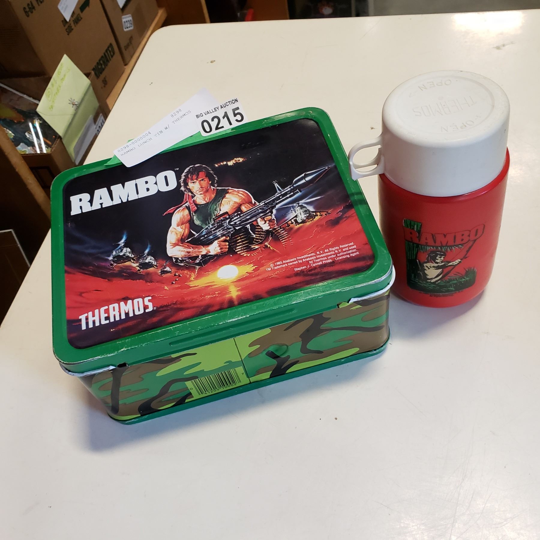1985 RAMBO LUNCH TIN W/ THERMOS - Big Valley Auction