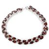 Image 1 : NATURAL AAA DARK ORANGE RED GARNET Bracelet