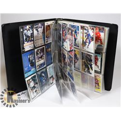 SMALL BINDER OF HOCKEY CARDS