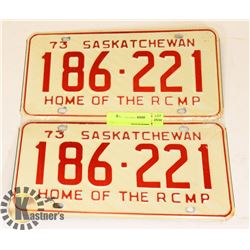 TWO "HOME OF THE RCMP" '73 SASKATCHEWAN PLATES