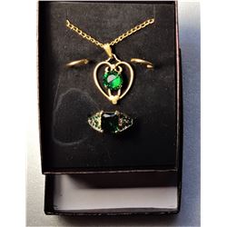 15)  GOLD TONE AND GREEN CZ HEART