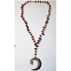 21)  POLISHED ROCK WITH COPPER MOON