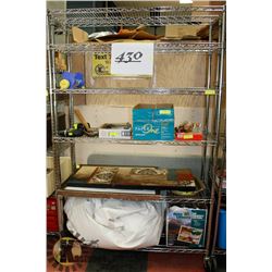 RACK OF UNCLAIMED MERCHANDISE