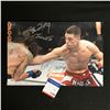 Image 1 : NATE DIAZ & CLAY GUIDA DUAL SIGNED 11X16 MMA PHOTO (PSA COA)