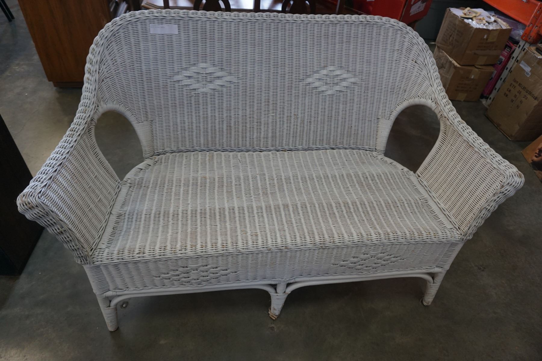 white wicker bench