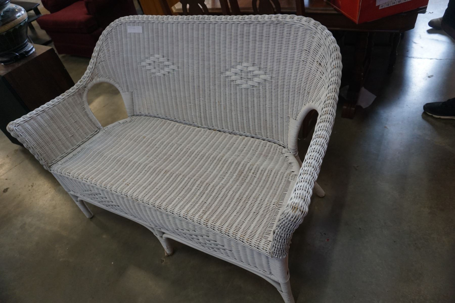 white wicker bench