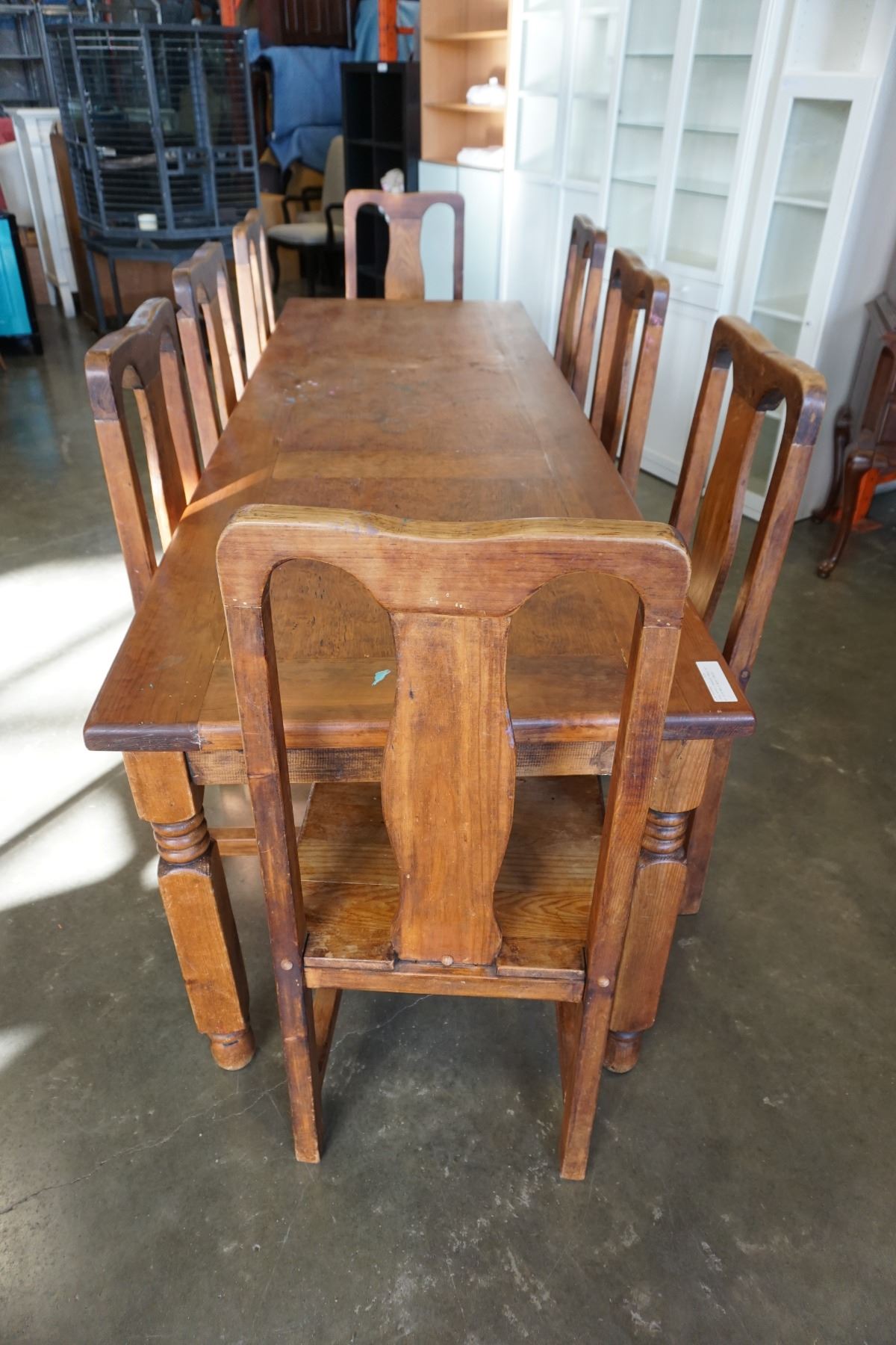 LARGE RUSTIC HARVEST TABLE 8FT BY 32IN AND 8 WOOD CHAIRS