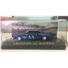 Image 2 : 3 Diecast Cars in Museum Cases. 2 are Racing Legends. 1 Racing Legend's Case is Cracked but Car is N