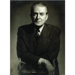 JACK WARNER SIGNED PHOTOGRAPH.