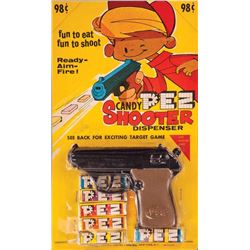 1965 PEZ CANDY SHOOTER GUN MINT ON CARD