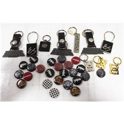 BAG OF ASSORTED SKATE BRAND KEYCHAINS & BUTTONS