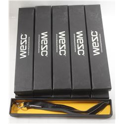 TRAY FULL OF WESC LEATHER KEYCHAINS