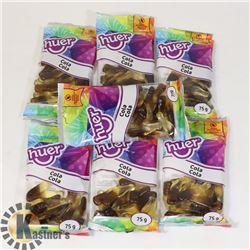 BAG OF COLA BOTTLE GUMMIES.