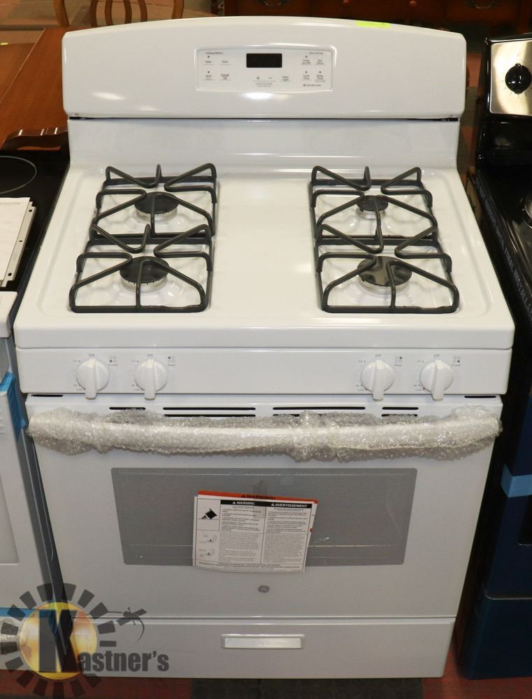 GE WHITE 4 BURNER GAS RANGE.