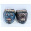 Image 1 : PAIR OF HAND CARVED WOODEN MASKS.