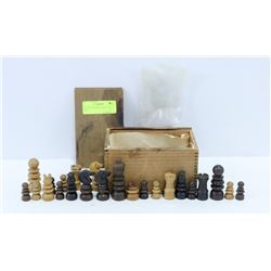 ANTIQUE WOODEN CHESS PIECES IN BOX.