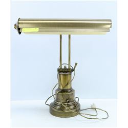 ANTIQUE BRASS ADJUSTABLE PIANO LAMP.