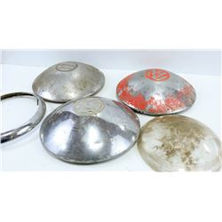 BOX OF 1960S VOLKSWAGEN BU HUBCUPS AND MORE.