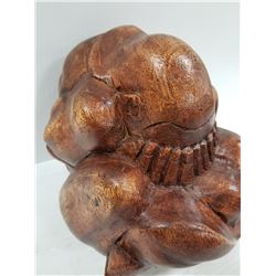 HANDCARVED WEEPING MONK FROM INDONESIA