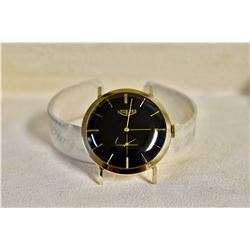 Longines Black Face 14k Gold.