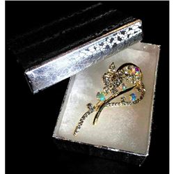 Elegant designer brooch with colorful rhinestones