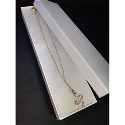 Golden designer necklace w/snake charm.