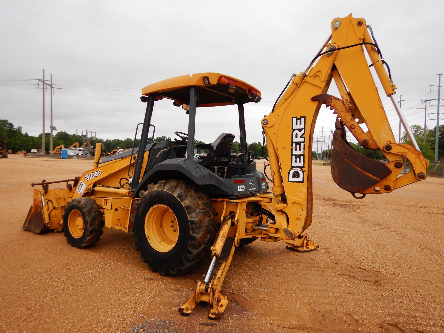 2005 JOHN DEERE 310SG Backhoe J.M. Wood Auction Company, Inc.