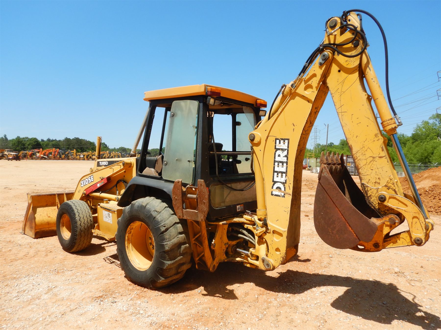 JOHN DEERE 310SE Backhoe J.M. Wood Auction Company, Inc.