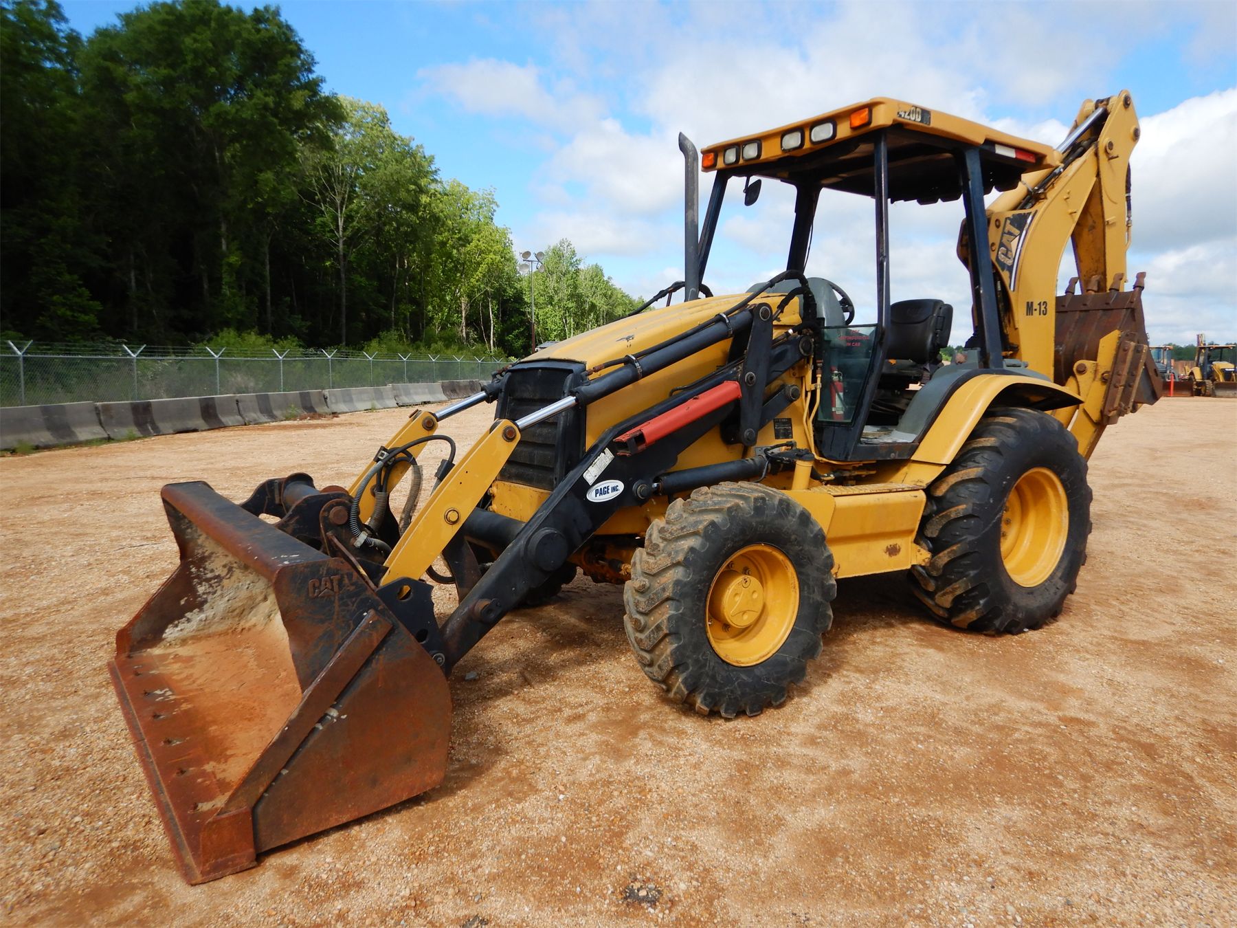 CATERPILLAR 420D IT Backhoe - J.M. Wood Auction Company, Inc.