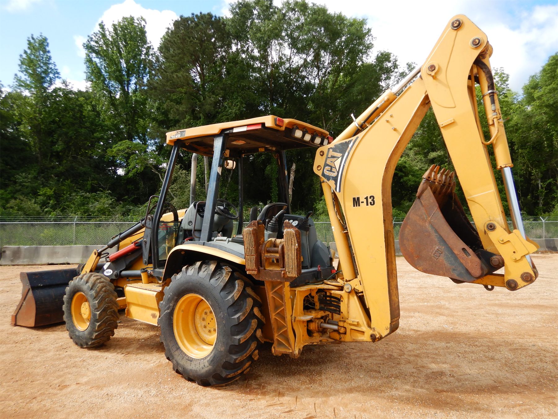 CATERPILLAR 420D IT Backhoe - J.M. Wood Auction Company, Inc.