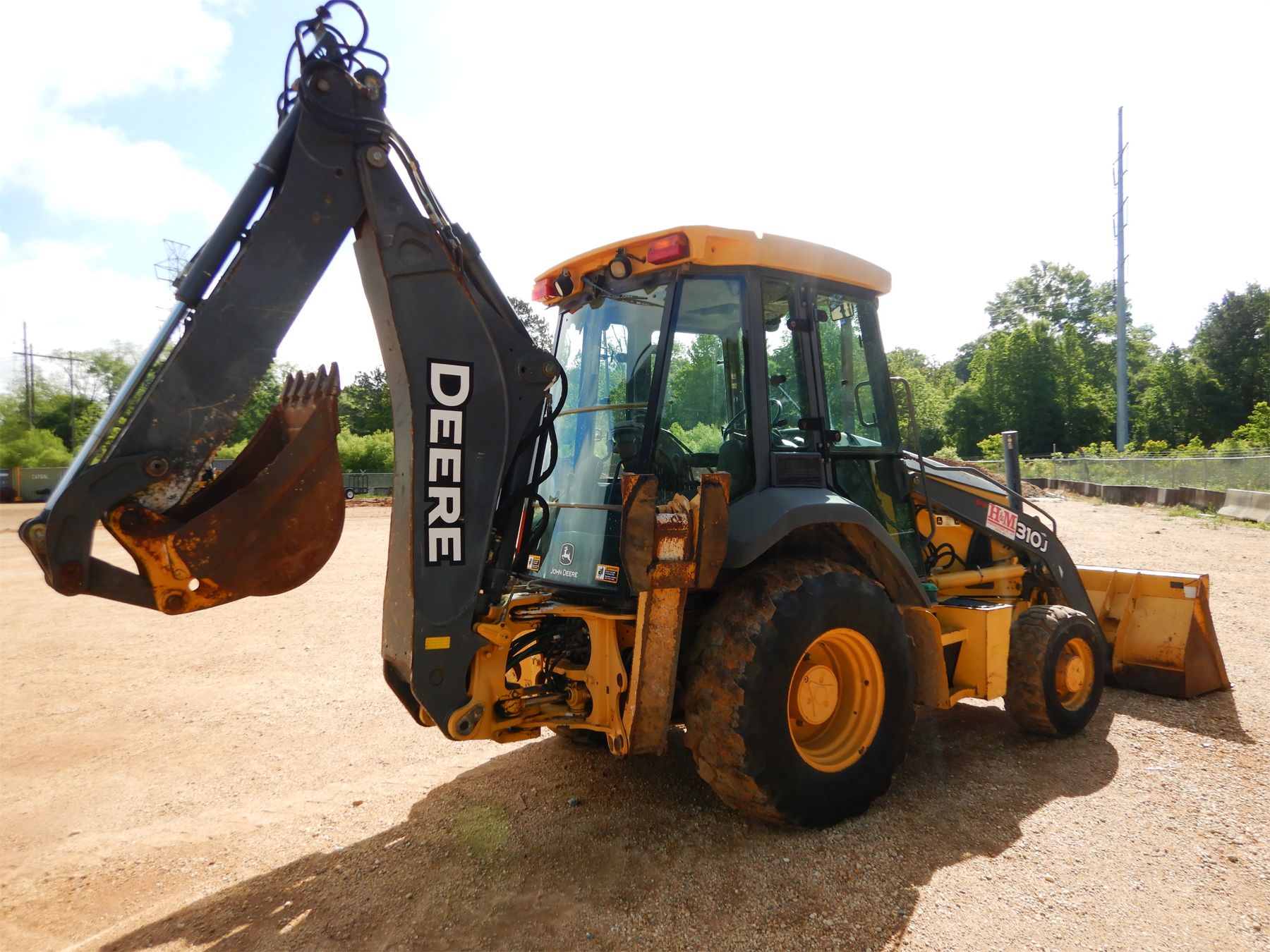 2011 JOHN DEERE 310J Backhoe J.M. Wood Auction Company, Inc.