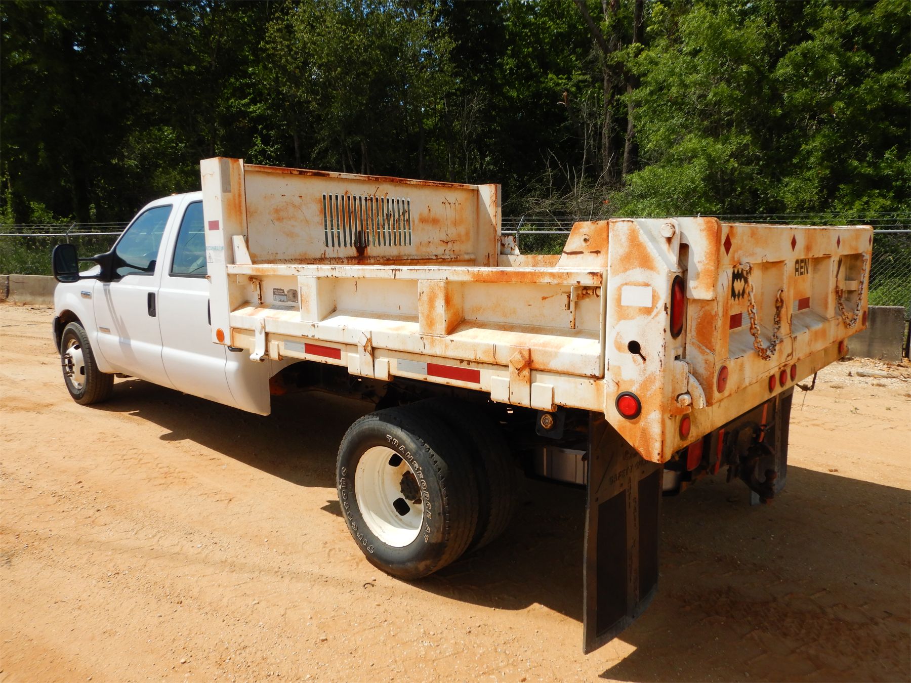 2006 FORD F350 Flatbed Dump Truck J.M. Wood Auction Company, Inc.