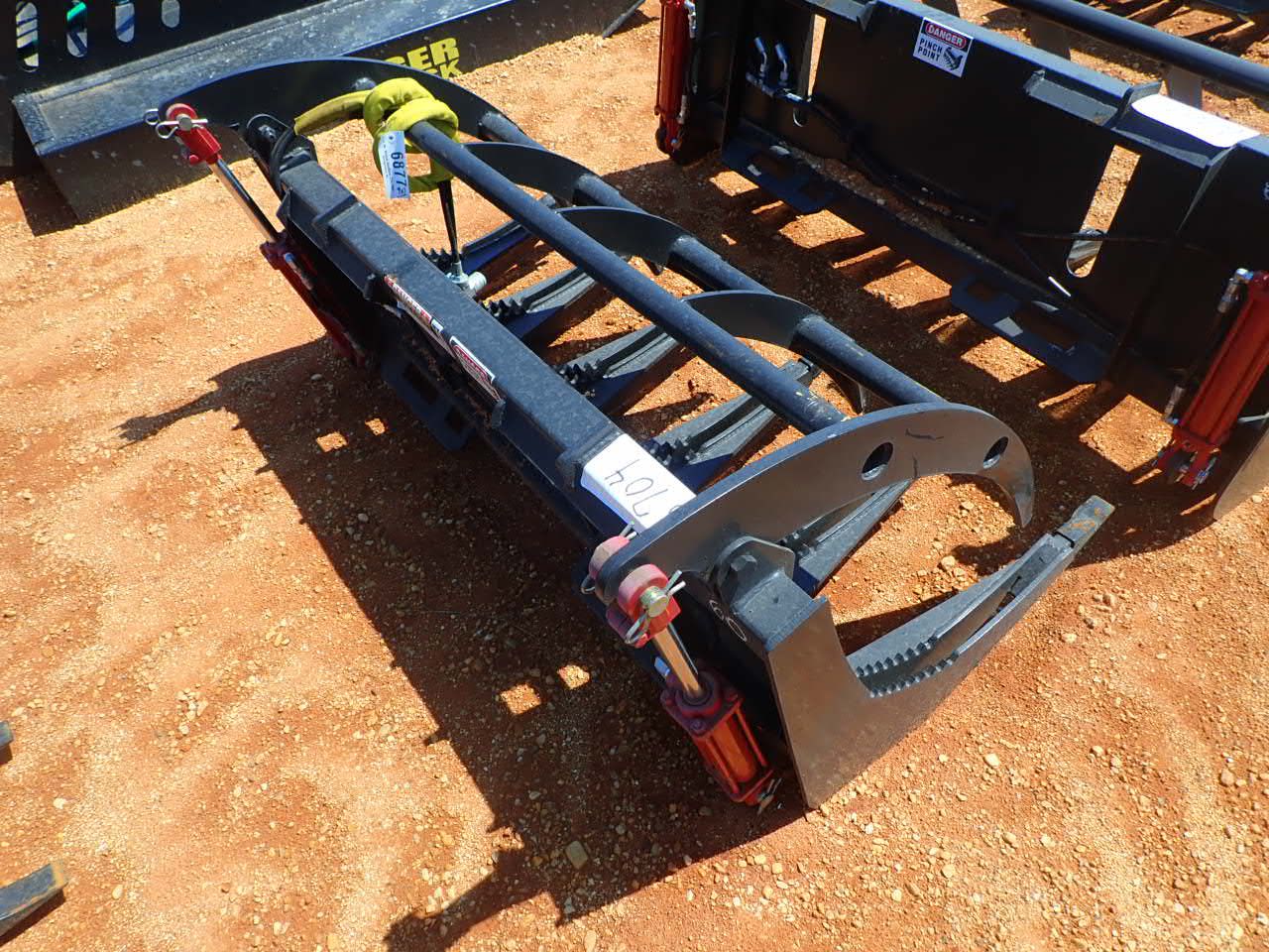 Skid Steer Attachment J.M. Wood Auction Company, Inc.