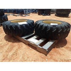 (2) 12x16.5 NHS tires mounted on John Deere rims (B8)