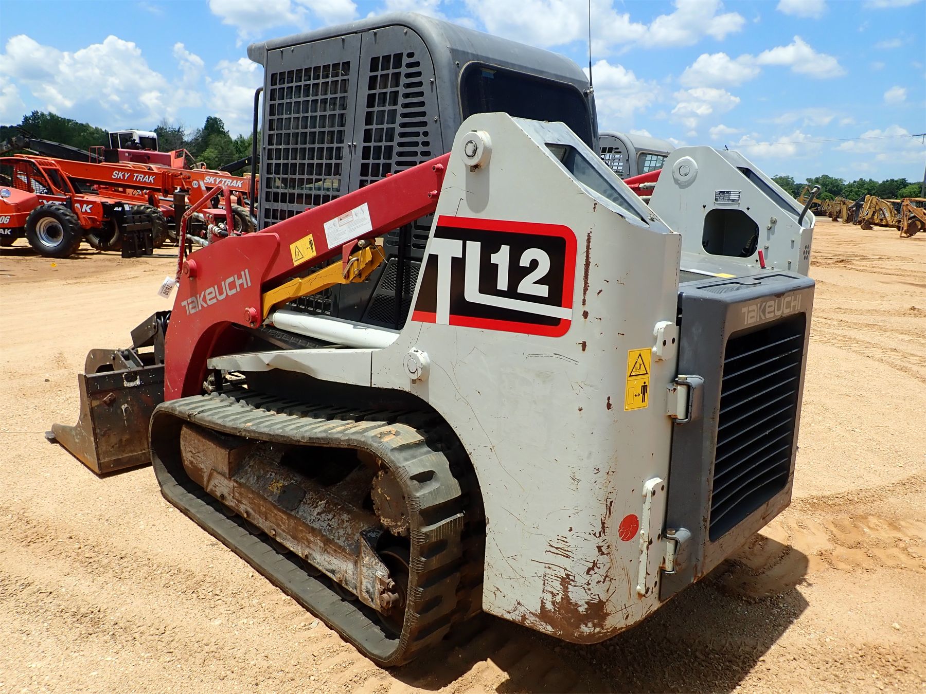 2016 TAKEUCHI TL12 Skid Steer Loader Crawler J.M. Wood Auction