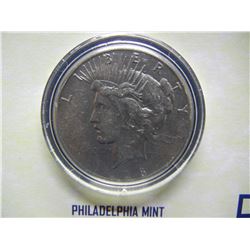 High Grade 1928 Peace Dollar in 1st Commemorative Pkg