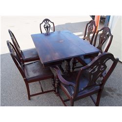 Antique Dining Room Table with one Captain's Chair and 5 Wooden Chairs