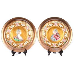 Pair of porcelain wall plaques.
