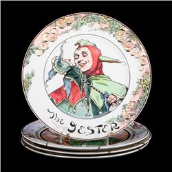 Four Royal Doulton plates.