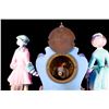Image 9 : A continental porcelain clock.