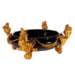 A marble and gilt metal center bowl.