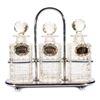Image 1 : A Tantalus decanter set.