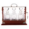 Image 1 : A locking Tantalus decanter set.