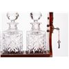 Image 2 : A locking Tantalus decanter set.