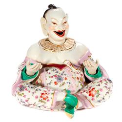 A Continental porcelain nodder.