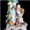 Image 11 : A pair of Meissen candlesticks.